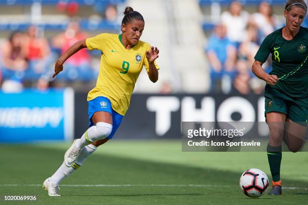 Brazil midfielder Debinaha chases the ball in game action during a Tournament of Nations match between Brazil vs Australia on July 26, 2018 at...