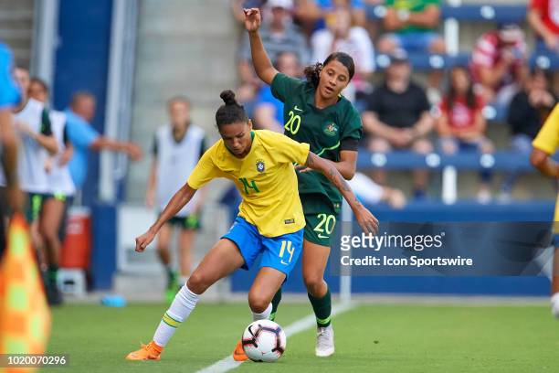 Brazil defender Poliana battles with Australia forward Sam Kerr for the ball in game action during a Tournament of Nations match between Brazil vs...
