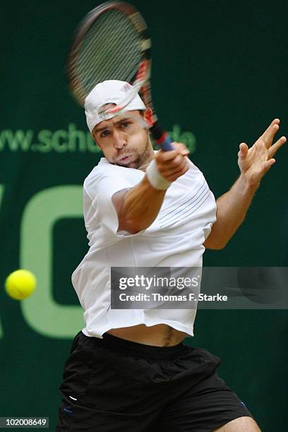 Benjamin Becker of Germany plays a forehand during his half final match against Lleyton Hewittof Australia during the Gerry Weber Open at the Gerry...