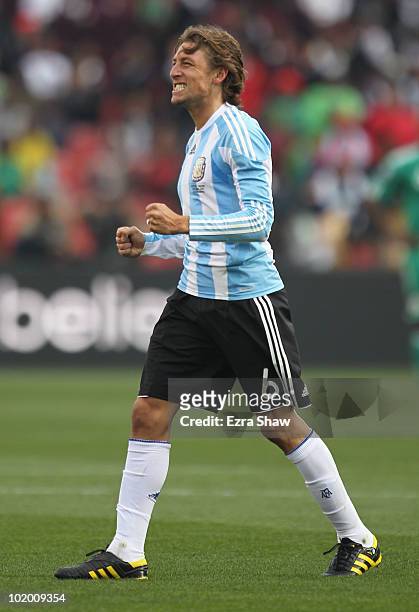 Gabriel Heinze of Argentina celebrates after he scores the opening goal during the 2010 FIFA World Cup South Africa Group B match between Argentina...