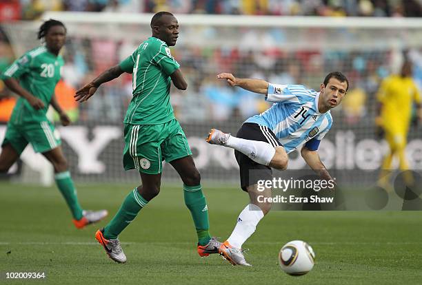 Sani Kaita of Nigeria closes down Javier Mascherano of Argentina during the 2010 FIFA World Cup South Africa Group B match between Argentina and...