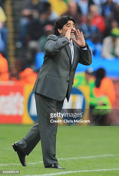 Diego Maradona head coach of Argentina directs his team during the 2010 FIFA World Cup South Africa Group B match between Argentina and Nigeria at...
