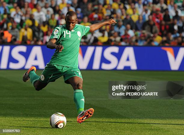 Nigeria's midfielder Sani Kaita kicks the ball during their Group B first round 2010 World Cup football match on June 12, 2010 at Ellis Park stadium...