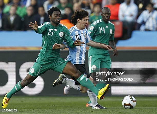 Argentina's striker Lionel Messi vies with Nigeria's midfielder Lukman Haruna and Nigeria's midfielder Sani Kaita during Argentina vs Nigeria their...