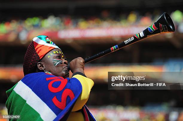 South Africa fan blows a Vuvuzela as she arrives for the Opening Ceremony ahead of the 2010 FIFA World Cup South Africa Group A match between South...