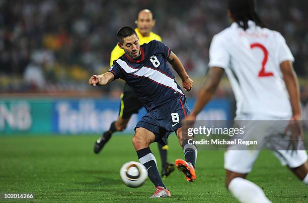 Clint Dempsey of the United States shoots and scores during the 2010 FIFA World Cup South Africa Group C match between England and USA at the Royal...