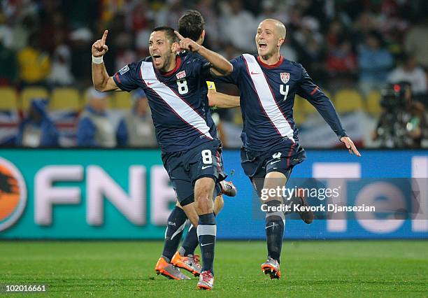 Clint Dempsey of the United States celebrates his goal with team mate Michael Bradley during the 2010 FIFA World Cup South Africa Group C match...