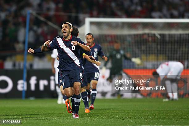 Clint Dempsey of the United States celebrates his team's first goal during the 2010 FIFA World Cup South Africa Group C match between England and USA...