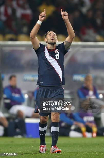 Clint Dempsey of the United States points to the heavens as he celebrates his goal during the 2010 FIFA World Cup South Africa Group C match between...