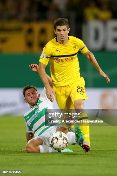 Christian Pulisic of Dortmund battles for the ball with Maximilian Wittek of Fuerth during the DFB Cup first round match between SpVgg Greuther...