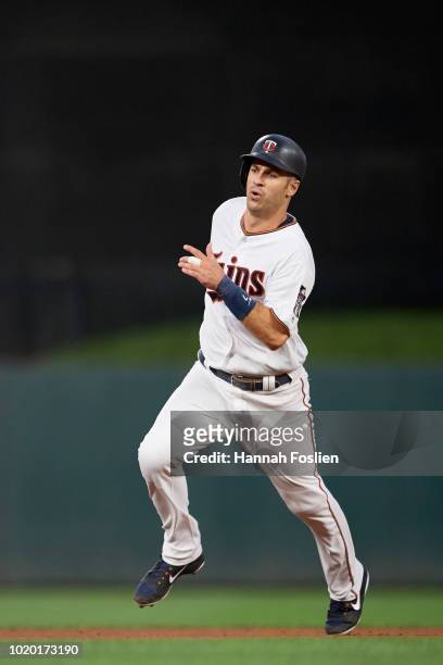 Joe Mauer of the Minnesota Twins runs the bases against the Pittsburgh Pirates during the interleague game on August 14, 2018 at Target Field in...