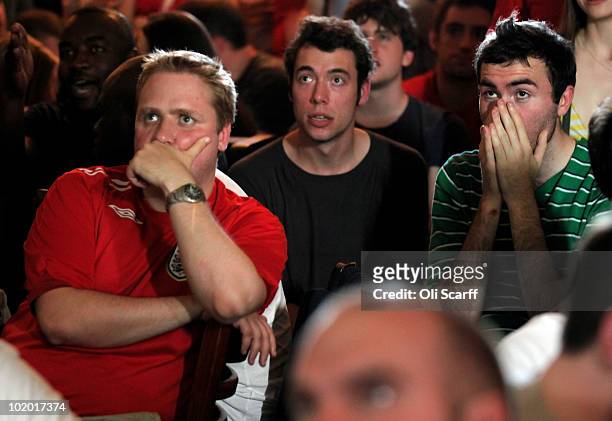 Football fans in Clapham watch England play their first game of the FIFA World Cup against the USA in South Africa on June 12, 2010 in London,...