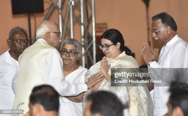 Senior BJP leader LK Advani meets family members of late Atal Bihari Vajpayee in an all party prayer meeting to pay homage to the former Prime...