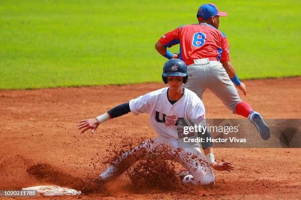 Manuel Beltre of Dominican Republic tagged out Charles Saum of United States in the 3rd inning during the WBSC U-15 World Cup Super Round match...