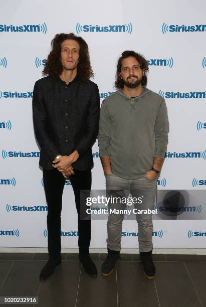 David Shaw and Zack Feinberg of the rock band "The Revivalists" visit the SiriusXM Studios on August 20, 2018 in New York City.