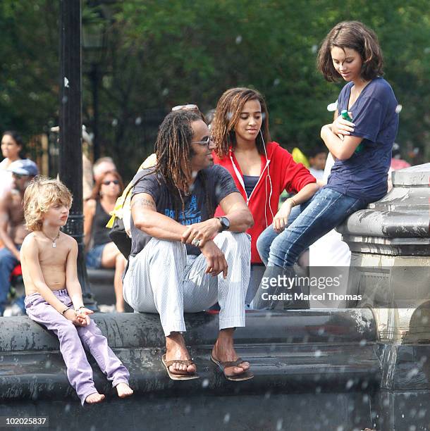Tennis great Yannick Noah is seen with kids Elyjah, Jenaye and Joalukas Noah in Washington Square Park on June 12, 2010 in New York, New York.