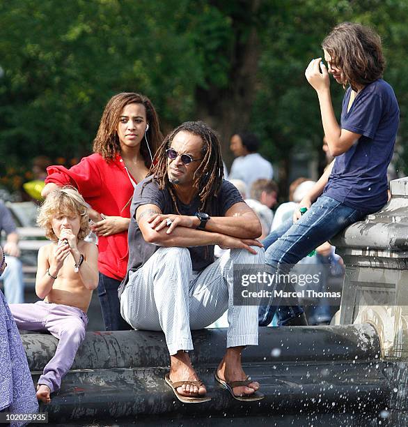 Tennis great Yannick Noah is seen with kids Elyjah, Jenaye and Joalukas Noah in Washington Square Park on June 12, 2010 in New York, New York.