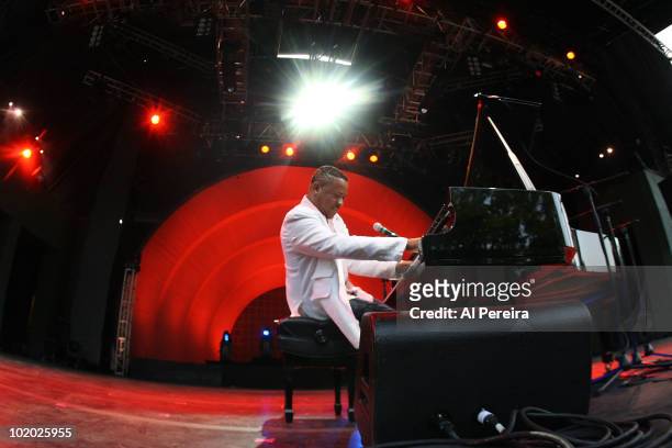 Pianist Davell Crawford performs on a bill with Allen Toussaint during the 32nd Celebrate Brooklyn Summer Season at the Prospect Park Bandshell on...