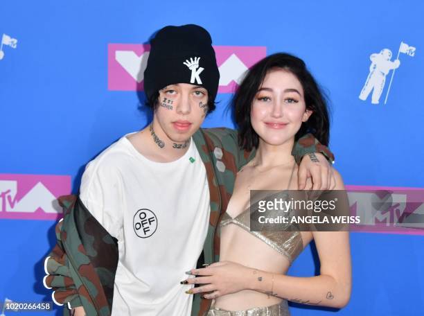 Rapper Lil Xan and US actress Noah Cyrus attend the 2018 MTV Video Music Awards at Radio City Music Hall on August 20, 2018 in New York City.