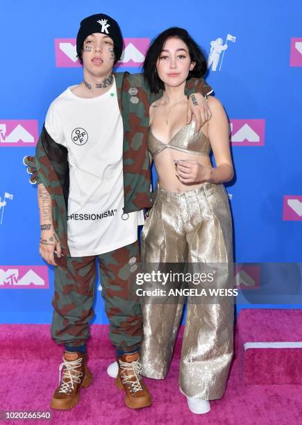 Rapper Lil Xan and US actress Noah Cyrus attend the 2018 MTV Video Music Awards at Radio City Music Hall on August 20, 2018 in New York City.