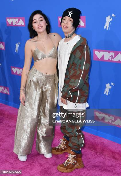 Rapper Lil Xan and US actress Noah Cyrus attend the 2018 MTV Video Music Awards at Radio City Music Hall on August 20, 2018 in New York City.