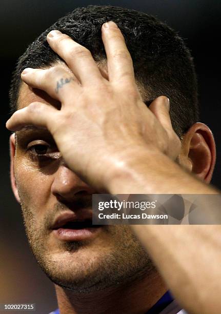 Brendan Fevola of the Lions walks of the ground after the round 12 AFL match between the Western Bulldogs and the Brisbane Lions at Etihad Stadium on...