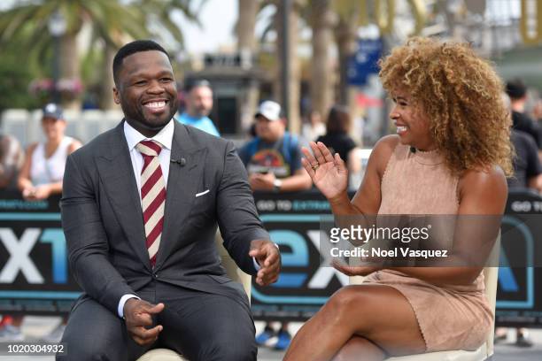 Cent and Tanika Ray visit "Extra" at Universal Studios Hollywood on August 20, 2018 in Universal City, California.