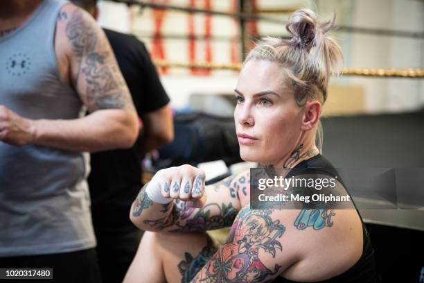 Australian UFC veteran and bare knuckle fighter Bec Rawlings gets taped up by her coach, John Bastable, at City of Angels Boxing Club on August 16,...