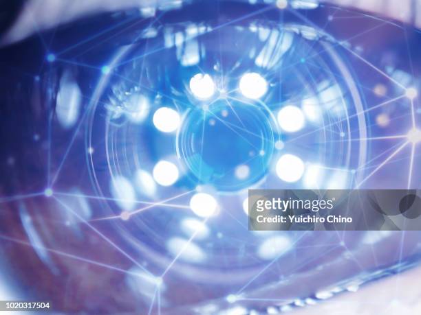 artificial intelligence data over the eye - iq test stock-fotos und bilder