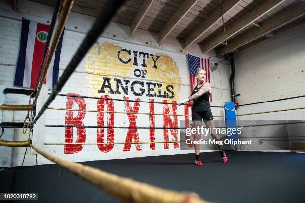 Australian UFC veteran and bare knuckle fighter Bec Rawlings warms up and demonstrates bare knuckle boxing moves at City of Angels Boxing Club on...