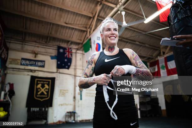 Australian UFC veteran and bare knuckle fighter Bec Rawlings answers media questions and undoes her tape at City of Angels Boxing Club on August 16,...
