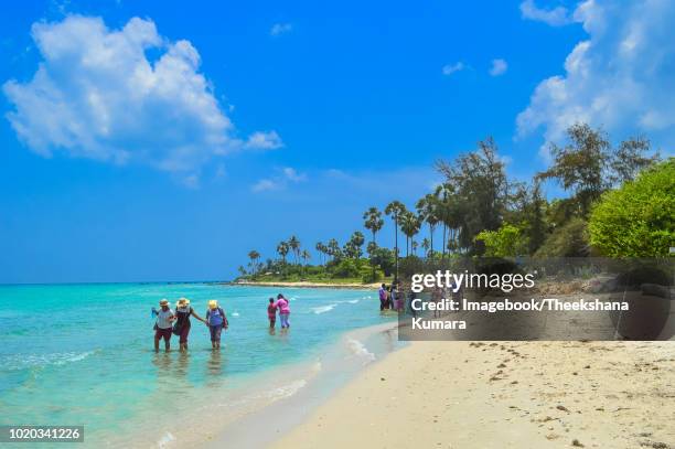 locals at mathagal beach (dambakolapatuna beach) - jaffna stock pictures, royalty-free photos & images