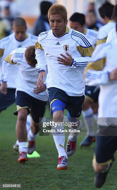 Yuichi Komano runs drills during a Japan training session at Free State Stadium on June 13, 2010 in Bloemfontein, South Africa.