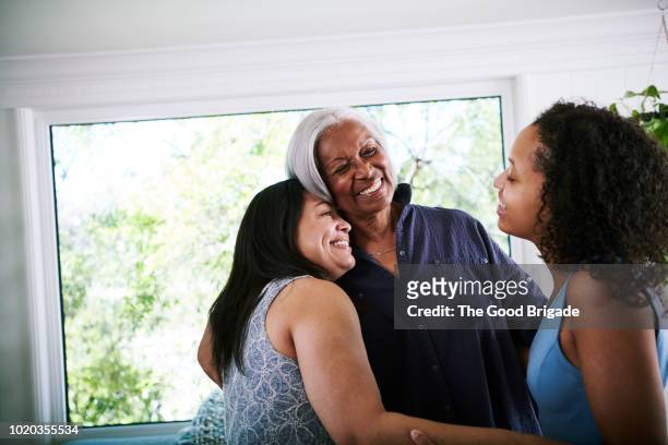 three generations of women bonding at home - multi generation family stock pictures, royalty-free photos & images