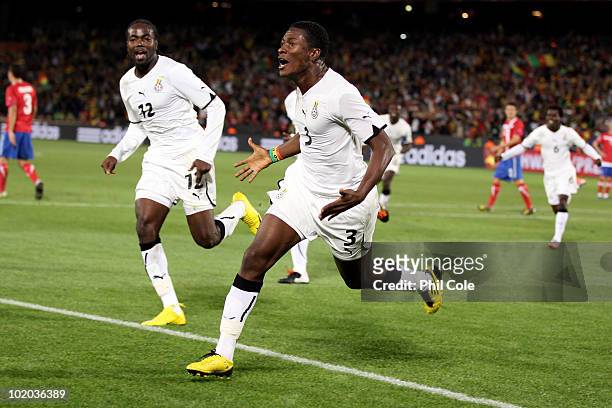 Asamoah Gyan of Ghana celebrates after scoring a penalty during the 2010 FIFA World Cup South Africa Group D match between Serbia and Ghana at Loftus...