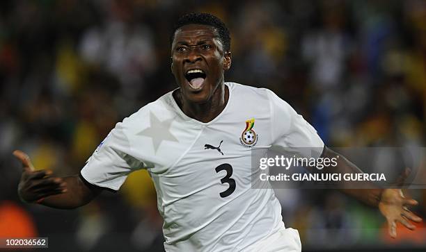 Ghana's striker Asamoah Gyan celebrates after scoring the opening goal against Serbia during the Group D first round 2010 World Cup football match...