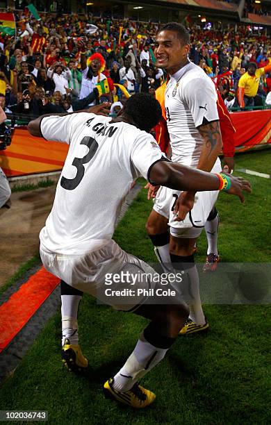 Kevin Prince Boateng of Ghana celebrates with goalscorer Asamoah Gyan of Ghana during the 2010 FIFA World Cup South Africa Group D match between...