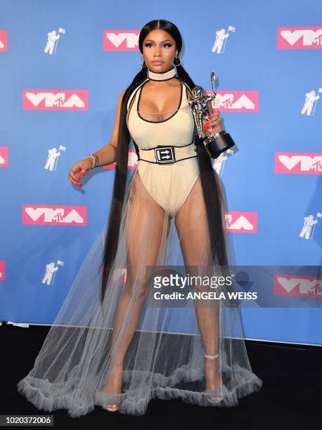 Trinidadian rapper Nicki Minaj holds her award for best hip-hop video in the press room at the 2018 MTV Video Music Awards at Radio City Music Hall...