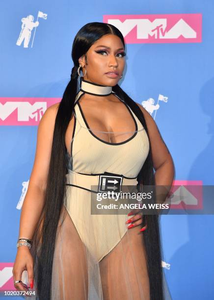 Trinidadian rapper Nicki Minaj poses in the press room at the 2018 MTV Video Music Awards at Radio City Music Hall on August 20, 2018 in New York...