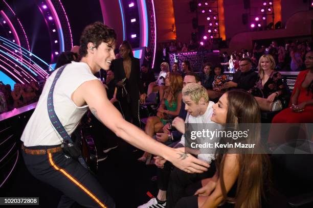 Shawn Mendes performs with Pete Davidson and Ariana Grande in the audience during the 2018 MTV Video Music Awards at Radio City Music Hall on August...