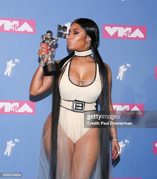 Rapper Nicki Minaj holds her award for best hip-hop video in the press room at the 2018 MTV Video Music Awards at Radio City Music Hall on August 20,...