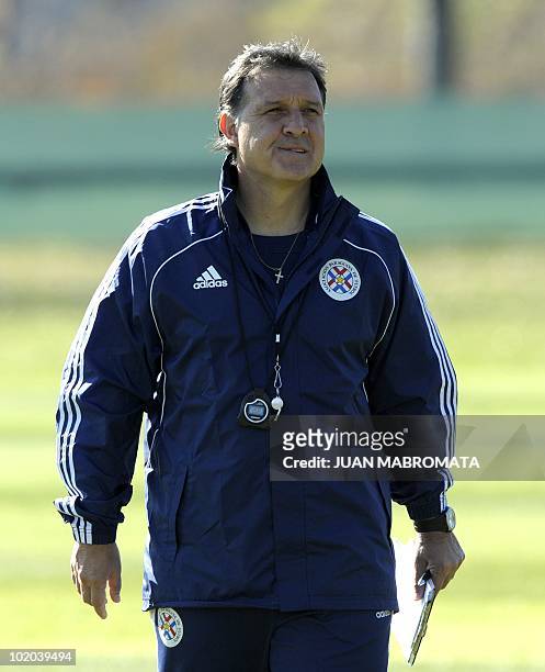 Paraguay's coach Gerardo Martino attends a training session at Michaelhouse School in Balgowan on June 13, 2010. The 2010 World Cup continues through...