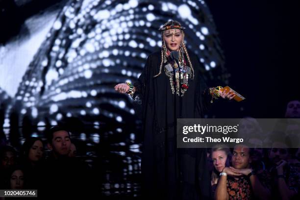 Madonna speaks onstage during the 2018 MTV Video Music Awards at Radio City Music Hall on August 20, 2018 in New York City.