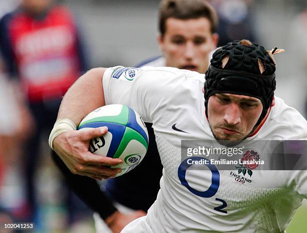 England's Joe Marler runs with the ball during a 2010 IRB Junior World Championship Pool B match between England and France at the El Coloso del...