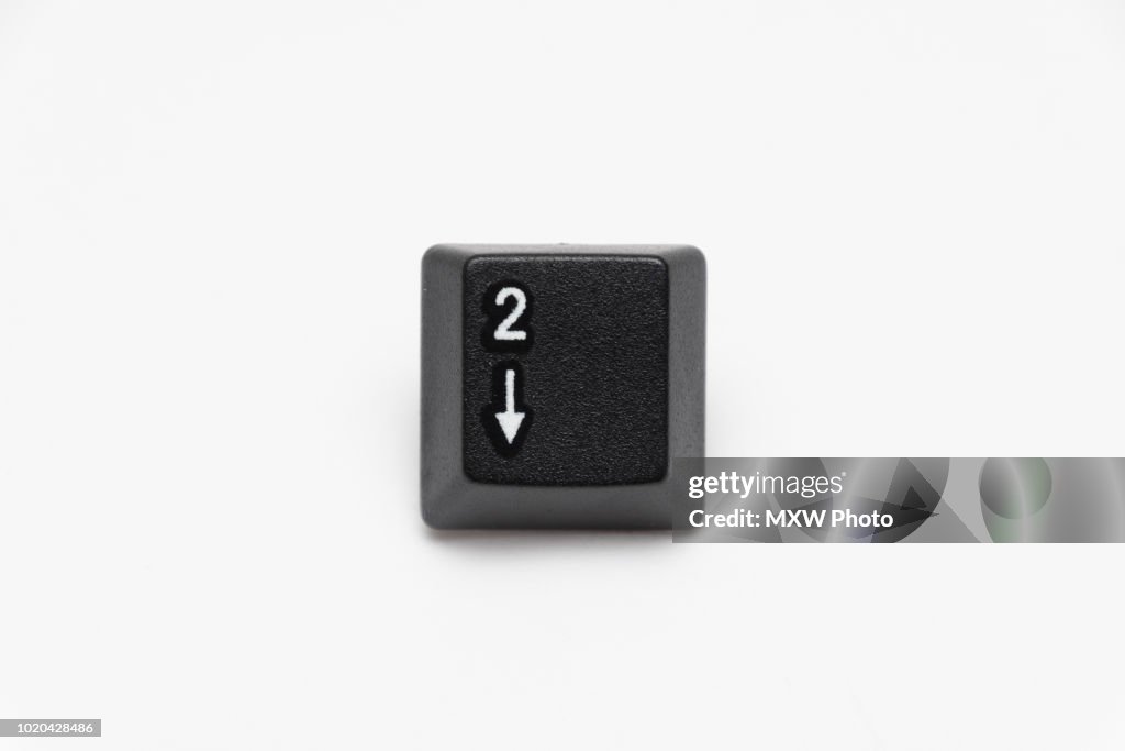 Single black keys of keyboard with different letters