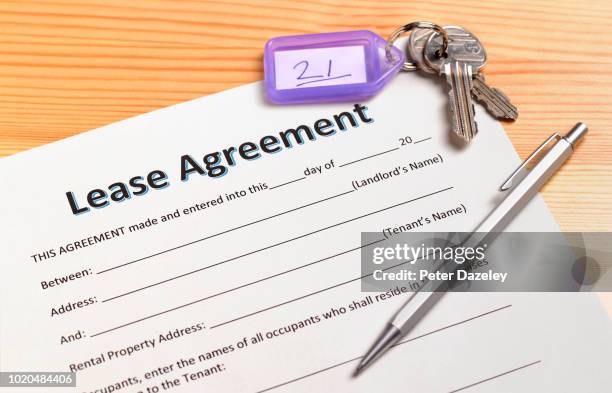 lease agreement with house keys - apartments rent stock pictures, royalty-free photos & images