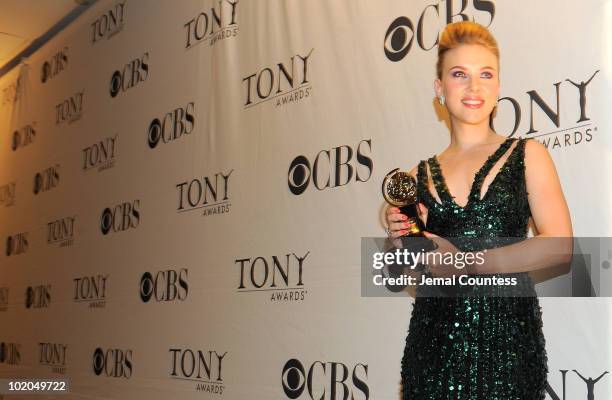 Scarlett Johansson poses with her award at the 64th Annual Tony Awards at The Sports Club/LA on June 13, 2010 in New York City.