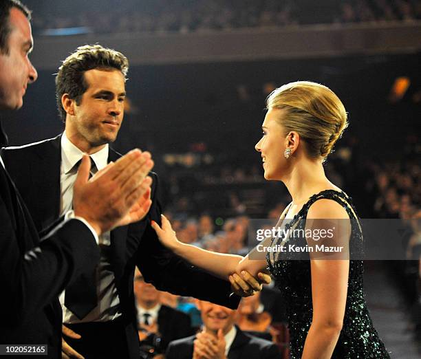 Ryan Reynolds and Scarlett Johansson in the audience at the 64th Annual Tony Awards at Radio City Music Hall on June 13, 2010 in New York City.