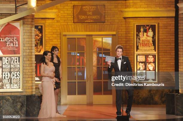 Lucy Liu and Eddie Redmayne onstage during the 64th Annual Tony Awards at Radio City Music Hall on June 13, 2010 in New York City.