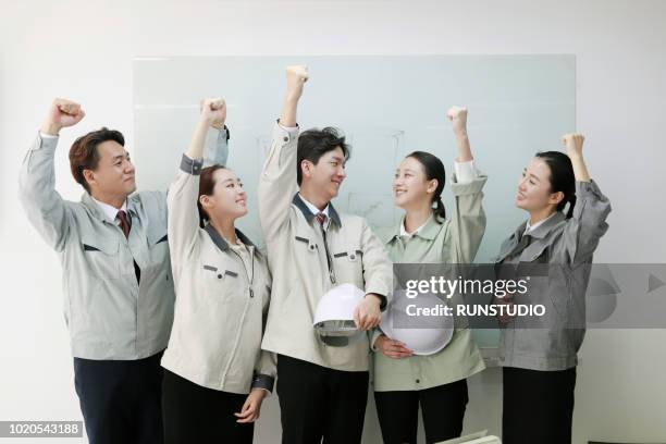 Workman Cheering 1,332 Asian Office Men Cheering Stock Photos, High-Res Pictures, and ...